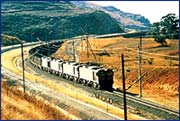 Head end, 200-wagon train: Electric 25kV heavy haul distributed power train with air brakes on COALlink Ermelo-Richards Bay line.